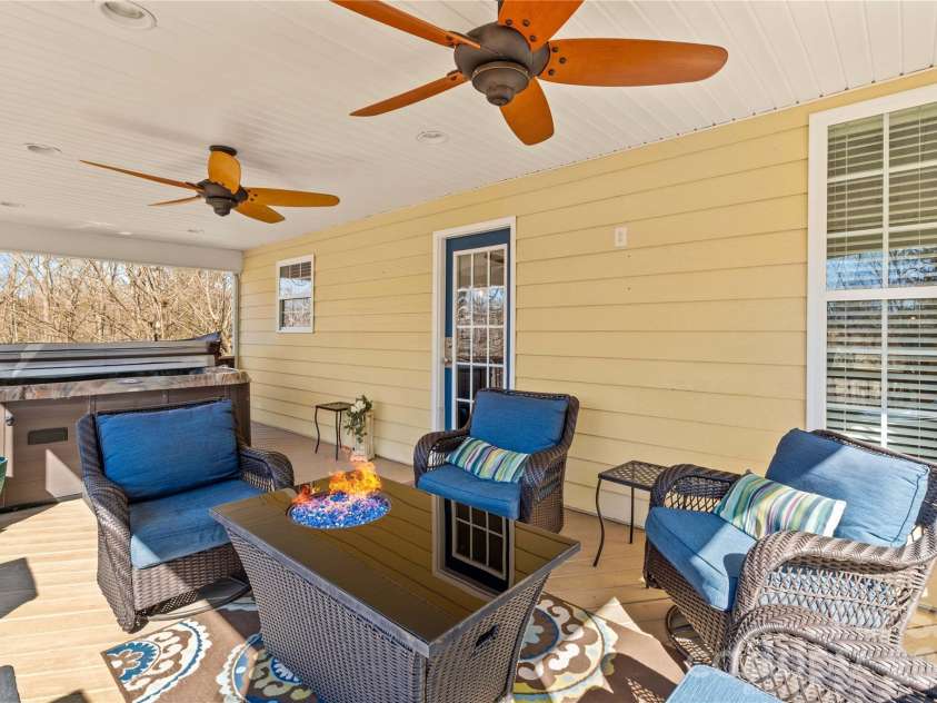 13603 Helen Benson Boulevard, Davidson, NC 28036.  MLS# CAR4341167, YatesRealty ID 12643. Spa/hottub included. This deck is to be enjoyed after a long day.