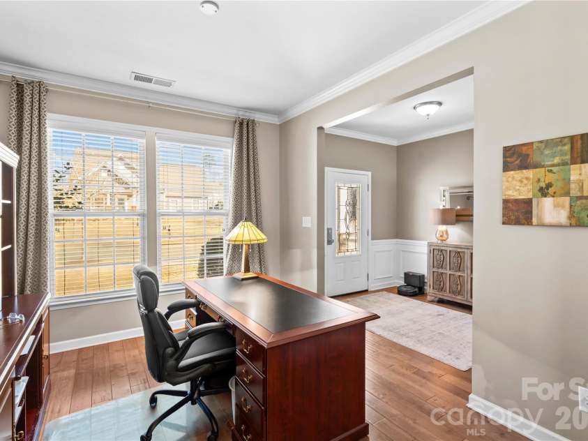 13603 Helen Benson Boulevard, Davidson, NC 28036.  MLS# CAR4341167, YatesRealty ID 12643. This flex space can be used as an office or separate seating area.