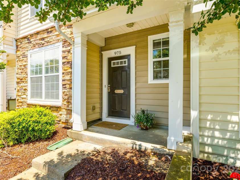 975 Copperstone Lane, Fort Mill, SC 29708.  MLS# CAR4253379, YatesRealty ID 12645. Covered front porch