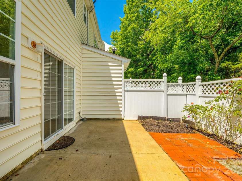 975 Copperstone Lane, Fort Mill, SC 29708.  MLS# CAR4253379, YatesRealty ID 12645. Fenced rear patio area with no homes behind!