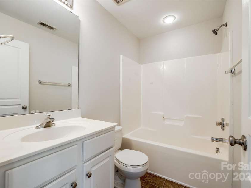 975 Copperstone Lane, Fort Mill, SC 29708.  MLS# CAR4253379, YatesRealty ID 12645. Hall bathroom upstairs