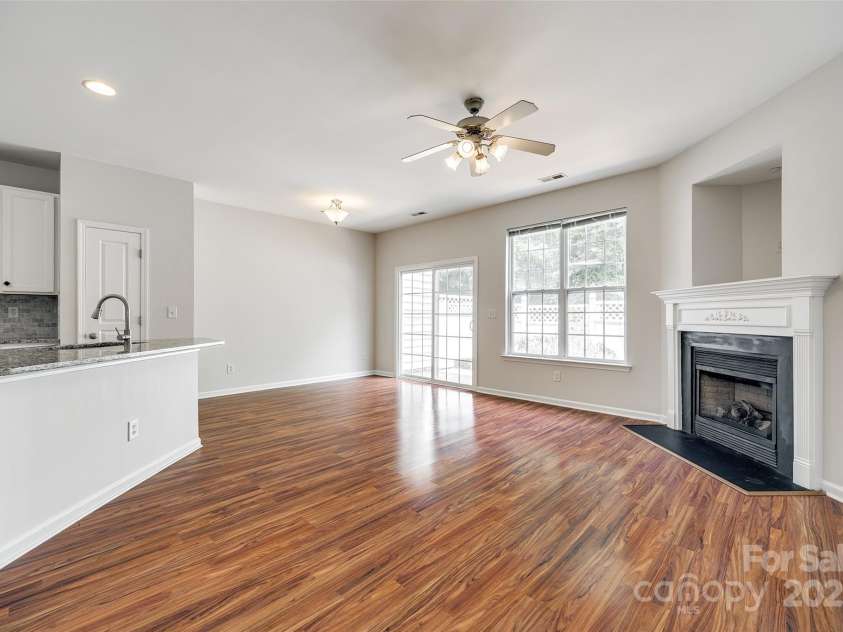 975 Copperstone Lane, Fort Mill, SC 29708.  MLS# CAR4253379, YatesRealty ID 12645. Living room and dining area with tons of natural light