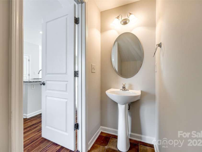 975 Copperstone Lane, Fort Mill, SC 29708.  MLS# CAR4253379, YatesRealty ID 12645. Powder room on main level