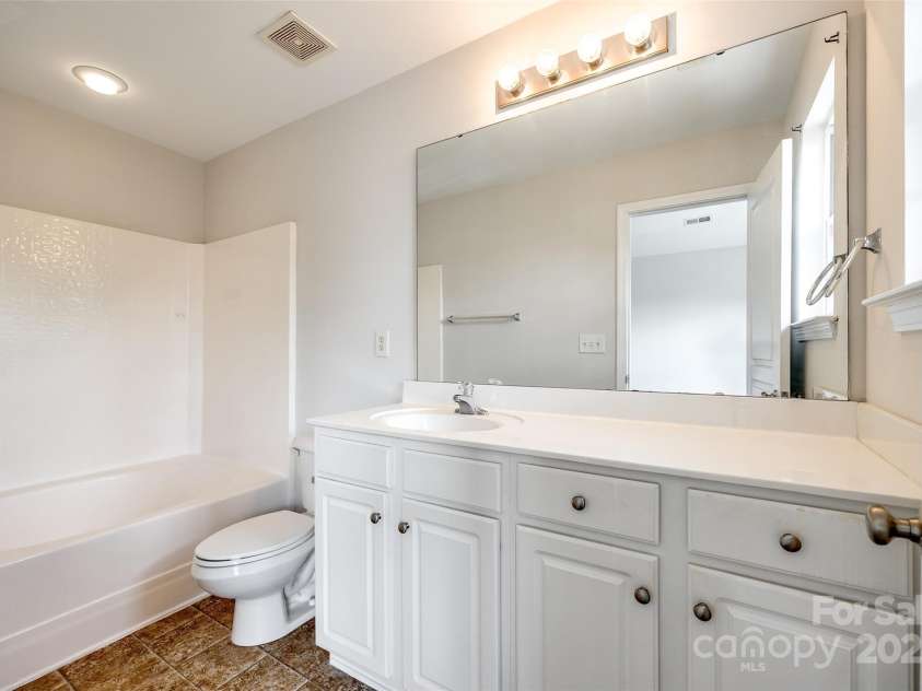 975 Copperstone Lane, Fort Mill, SC 29708.  MLS# CAR4253379, YatesRealty ID 12645. Primary bathroom upstairs