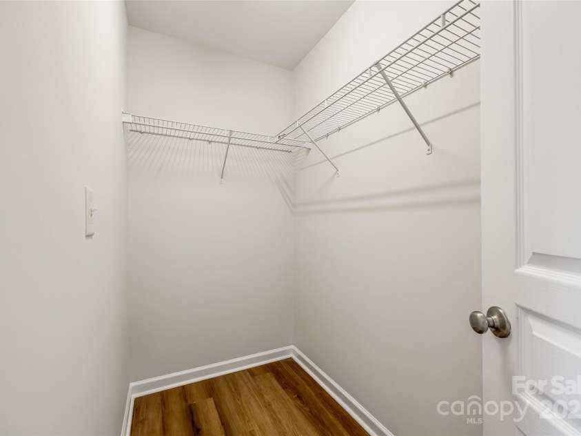 975 Copperstone Lane, Fort Mill, SC 29708.  MLS# CAR4253379, YatesRealty ID 12645. Walk-in closet in primary bedroom