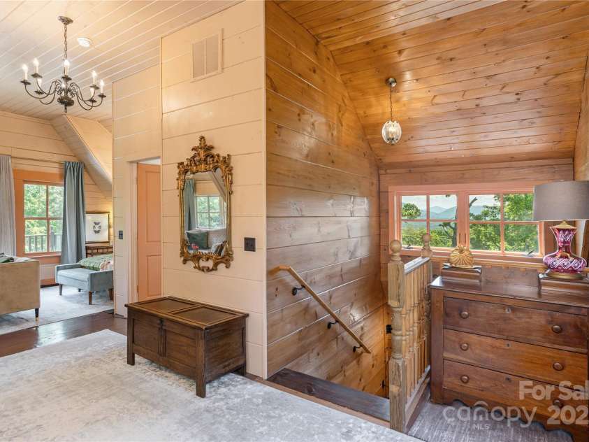 106 McCauley Drive, Asheville, NC 28803.  MLS# CAR4255495, YatesRealty ID 12646. Stairs entering upper level