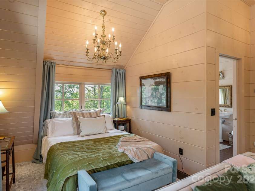 106 McCauley Drive, Asheville, NC 28803.  MLS# CAR4255495, YatesRealty ID 12646. Upper Level Primary Bedroom