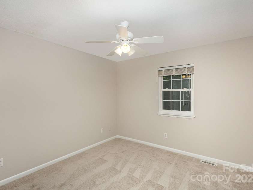 3178 Heathstead Place, Charlotte, NC 28210.  MLS# CAR4176096, YatesRealty ID 12647. BEDROOM 2 CUSTOM BLINDS AND CEILNG FAN