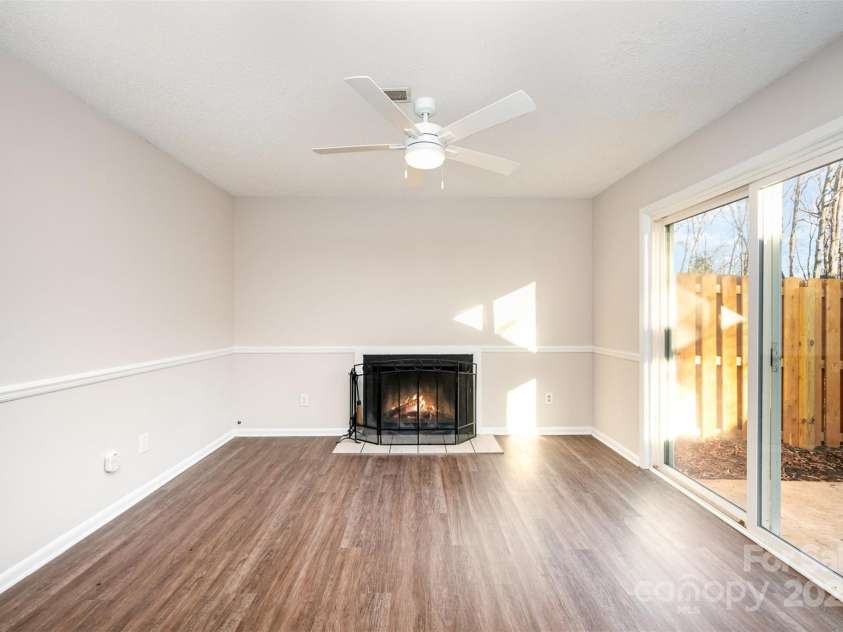 3178 Heathstead Place, Charlotte, NC 28210.  MLS# CAR4176096, YatesRealty ID 12647. GREAT ROOM OFF THE KITCHEN OPEN TO THE PATIO