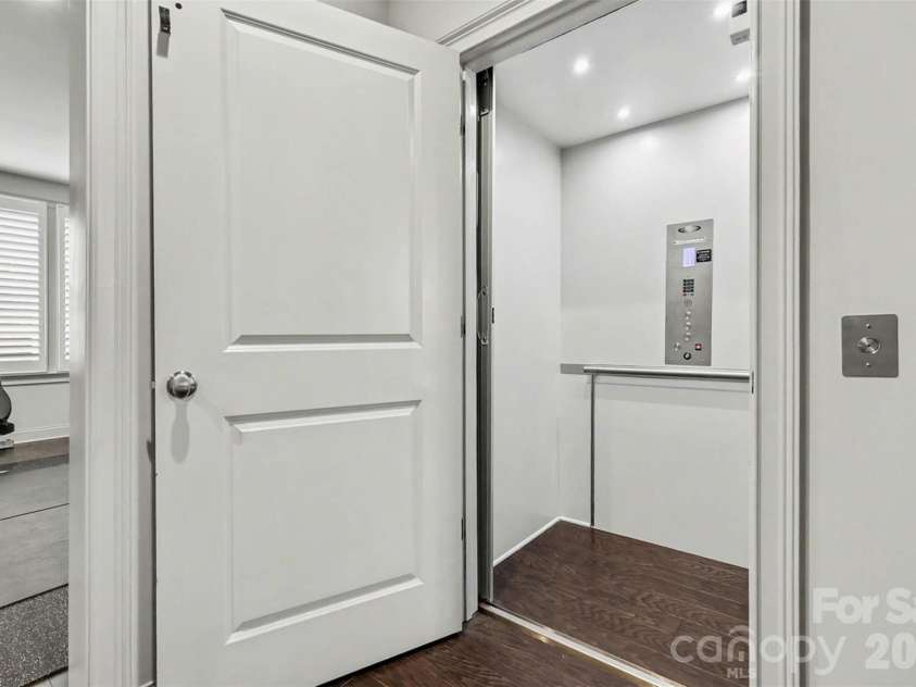 3030 Fairview Villa Court, Charlotte, NC 28209.  MLS# CAR4354421, YatesRealty ID 12648. Inside Elevator