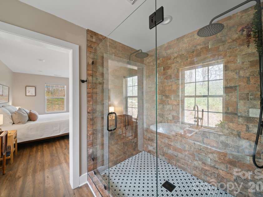 527 Floyd Blackwell Road, Tryon, NC 28782.  MLS# CAR4360131, YatesRealty ID 12649. Dual head custom shower