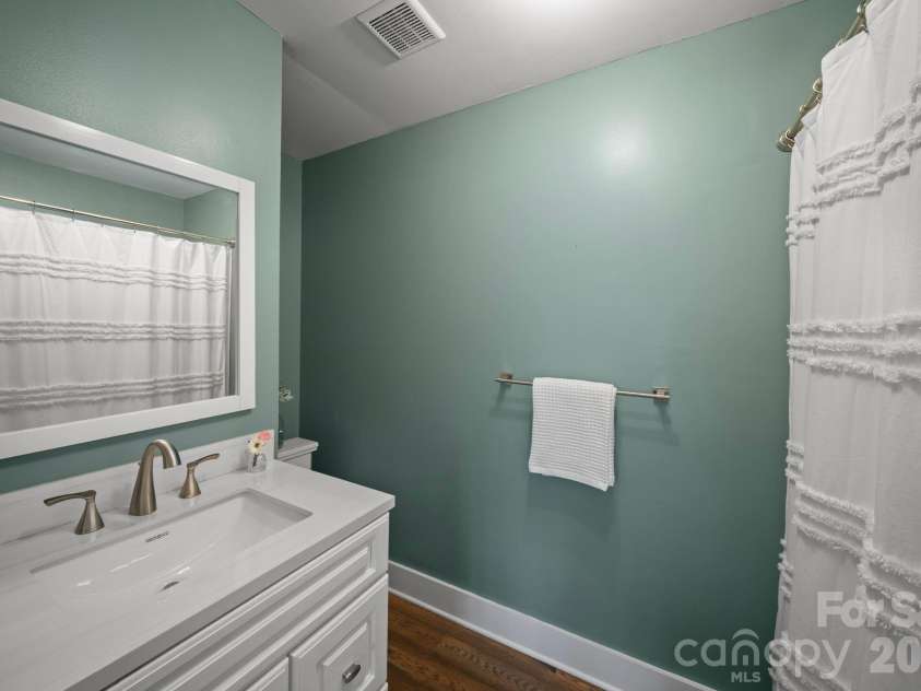 527 Floyd Blackwell Road, Tryon, NC 28782.  MLS# CAR4360131, YatesRealty ID 12649. Full bath off great room.
