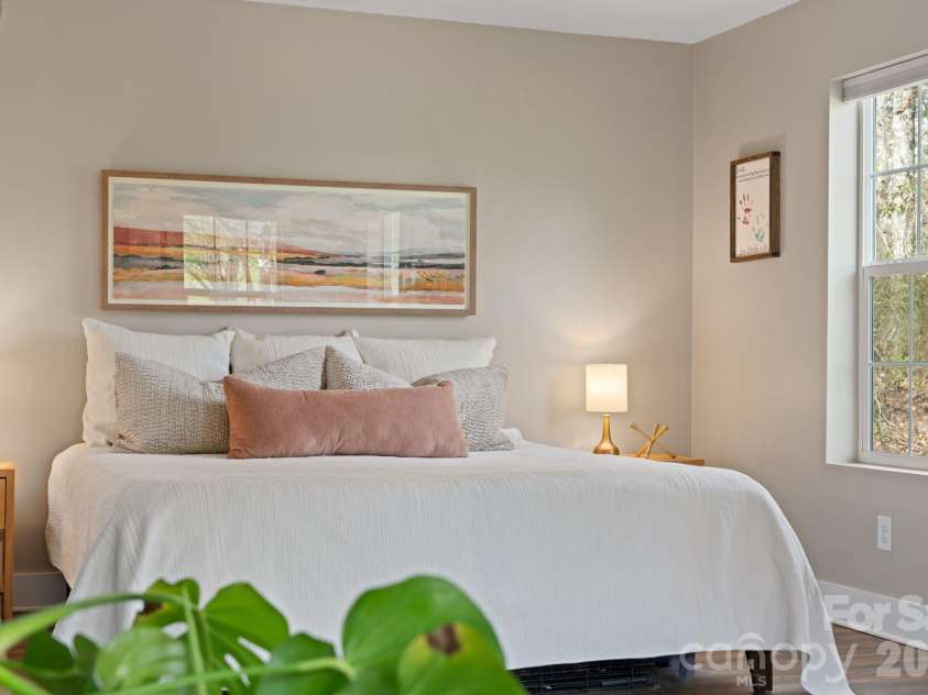 527 Floyd Blackwell Road, Tryon, NC 28782.  MLS# CAR4360131, YatesRealty ID 12649. Spa-like Primary Bedroom.