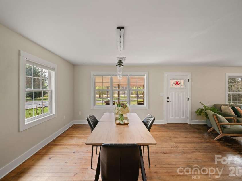 527 Floyd Blackwell Road, Tryon, NC 28782.  MLS# CAR4360131, YatesRealty ID 12649. The dining area can accommodate just about any sized table.