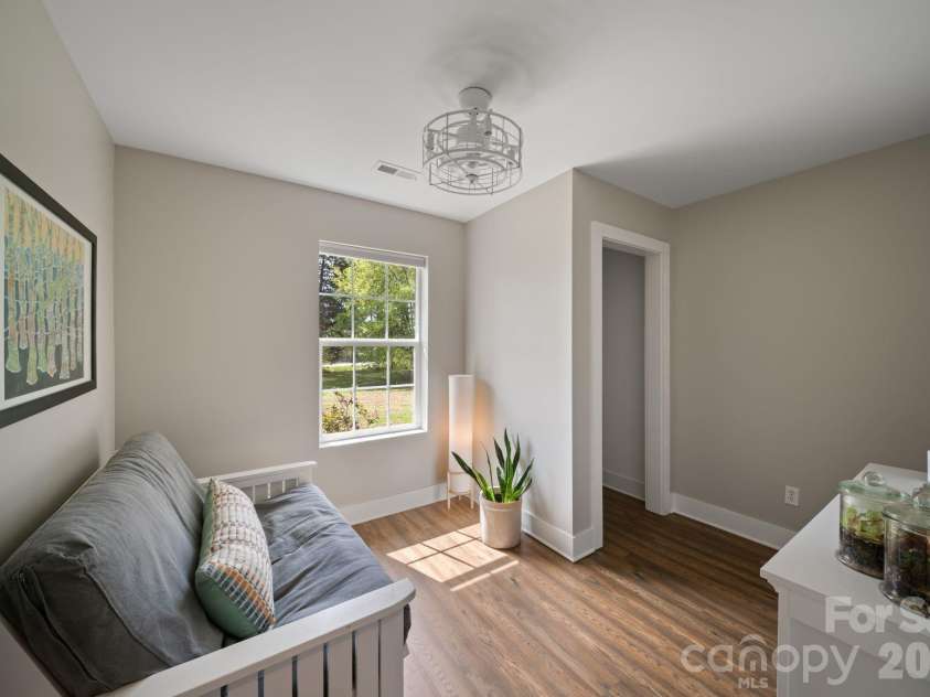 527 Floyd Blackwell Road, Tryon, NC 28782.  MLS# CAR4360131, YatesRealty ID 12649. This bedroom being used as a study.