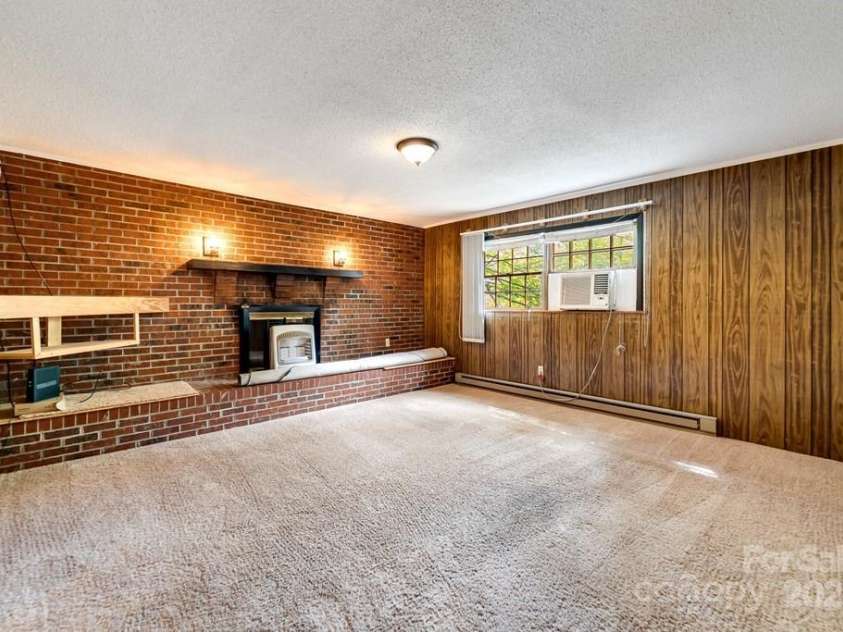 1168 North Country Club Drive, Cullowhee, NC 28723.  MLS# CAR4306285, YatesRealty ID 1265. 