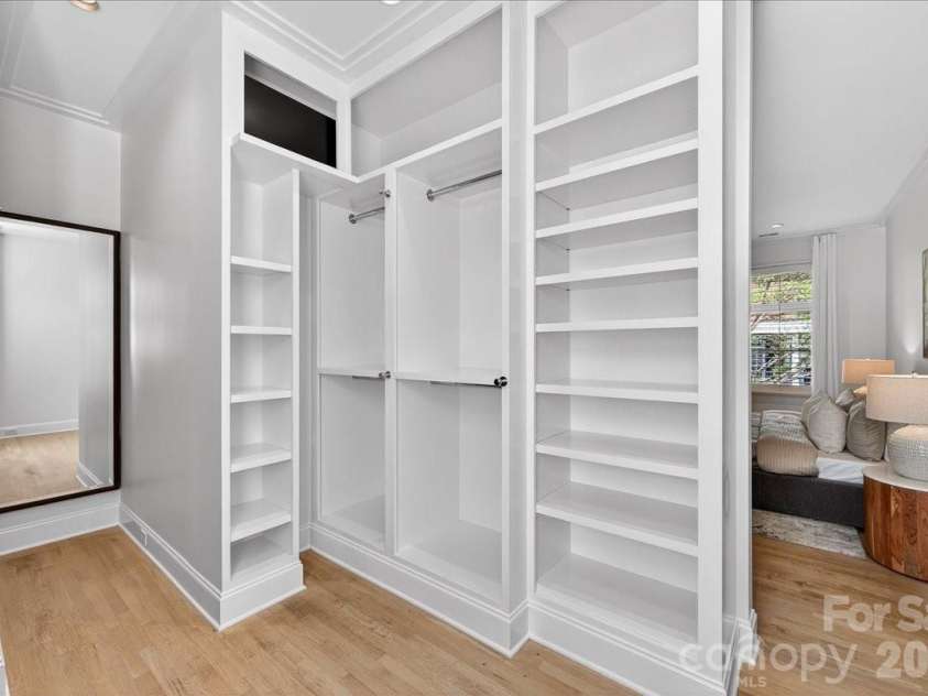 631 Vendue Place, Charlotte, NC 28226.  MLS# CAR4364198, YatesRealty ID 12655. Primary Custom Walk-In Closet with Built-Ins