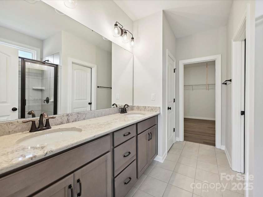 2229 Camber Drive, Gastonia, NC 28054.  MLS# CAR4244592, YatesRealty ID 12656. Premier Bath