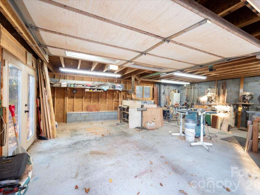 105 Avondale Heights Road, Asheville, NC 28803.  MLS# CAR4351474, YatesRealty ID 12665. One car garage includes workshop space and upper level storage space