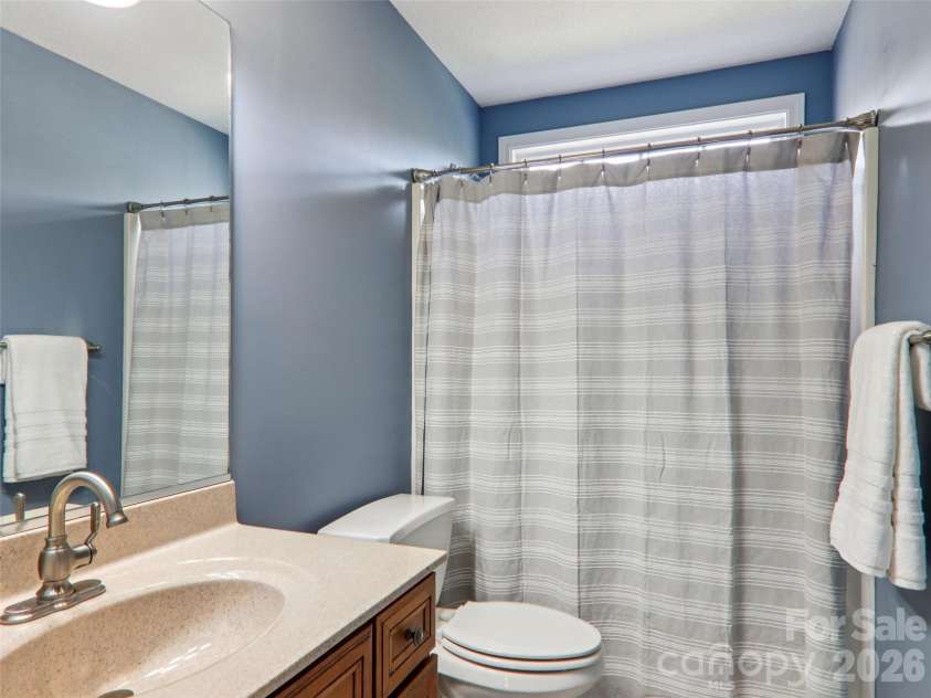 74 Woodson Drive, Mars Hill, NC 28754.  MLS# CAR4355311, YatesRealty ID 12666. 2nd full bathroom on main level