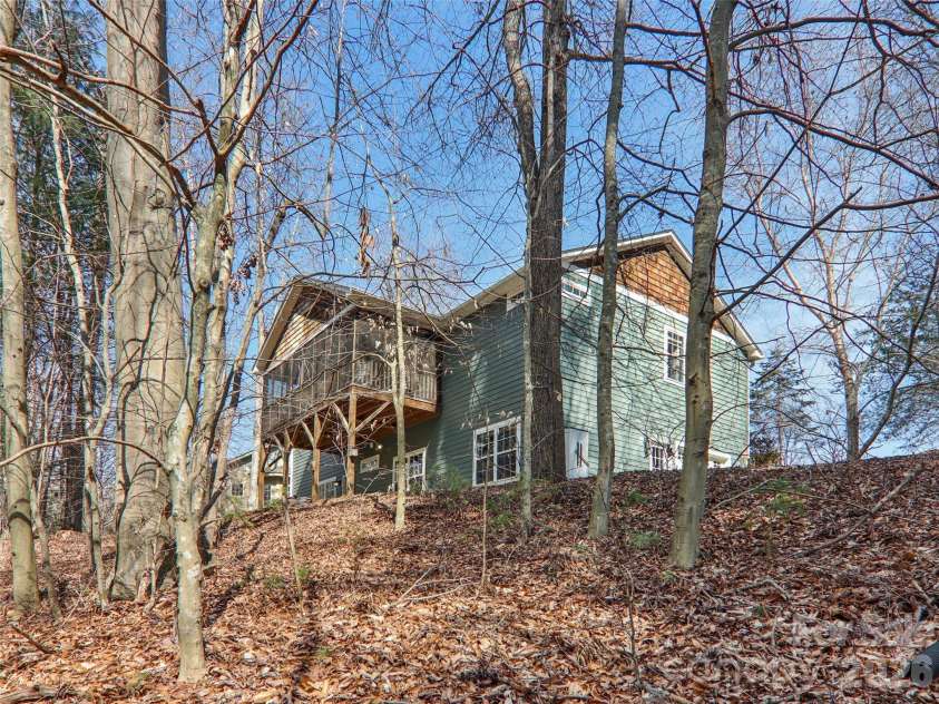 74 Woodson Drive, Mars Hill, NC 28754.  MLS# CAR4355311, YatesRealty ID 12666. Back view of house