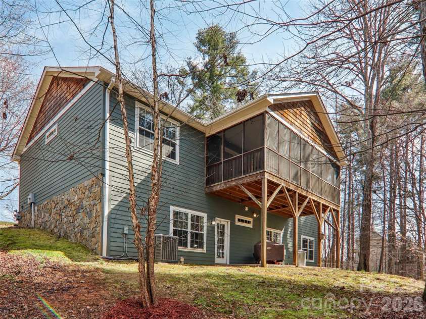 74 Woodson Drive, Mars Hill, NC 28754.  MLS# CAR4355311, YatesRealty ID 12666. Back view of house 
