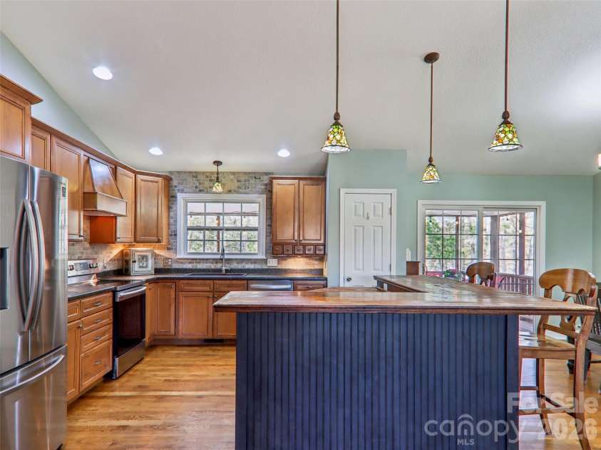 74 Woodson Drive, Mars Hill, NC 28754.  MLS# CAR4355311, YatesRealty ID 12666. Kitchen w/custom cabinetry 