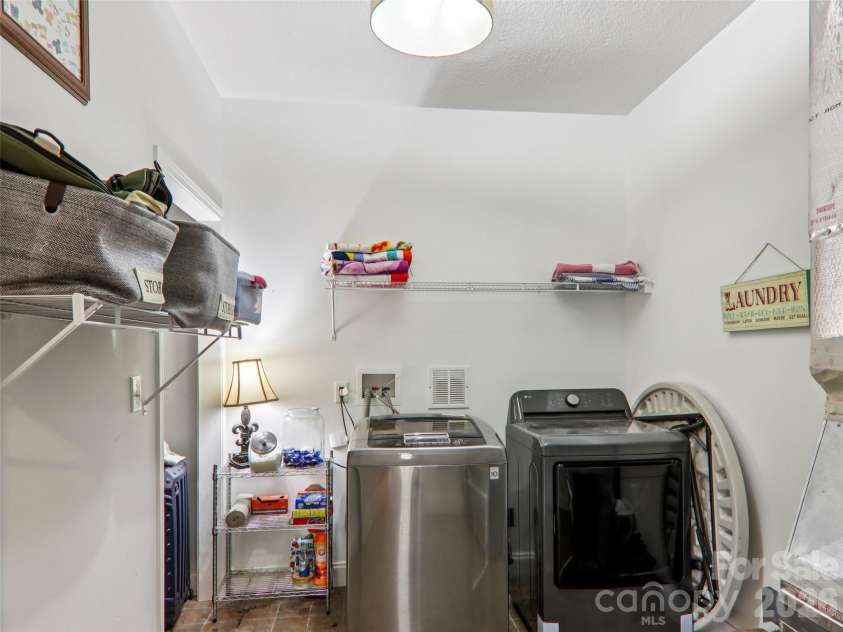 74 Woodson Drive, Mars Hill, NC 28754.  MLS# CAR4355311, YatesRealty ID 12666. Laundry on basement level