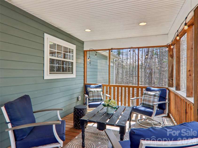 74 Woodson Drive, Mars Hill, NC 28754.  MLS# CAR4355311, YatesRealty ID 12666. Plenty of sitting area on deck