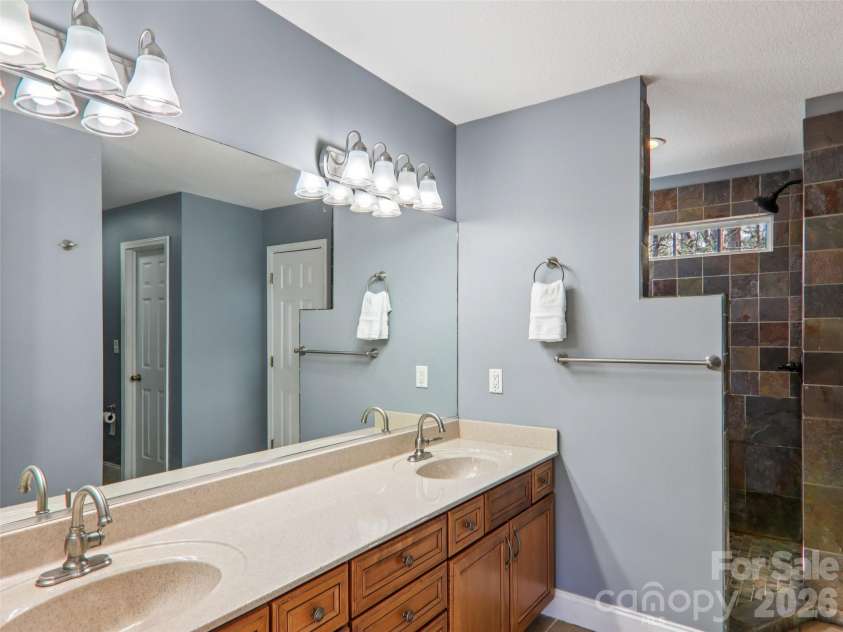 74 Woodson Drive, Mars Hill, NC 28754.  MLS# CAR4355311, YatesRealty ID 12666. Primary bathroom