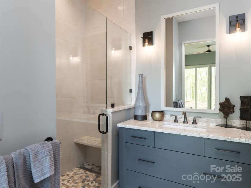 391 High Hickory Trail, Swannanoa, NC 28778.  MLS# CAR4255021, YatesRealty ID 12669. 2nd of two Lower Level Baths