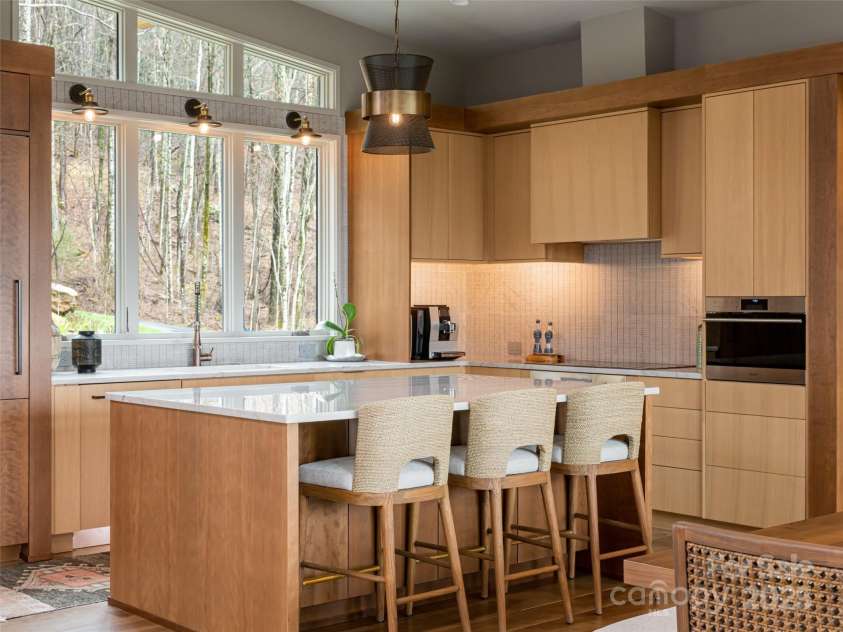 391 High Hickory Trail, Swannanoa, NC 28778.  MLS# CAR4255021, YatesRealty ID 12669. Ample Chef's Kitchen with high-end appliances