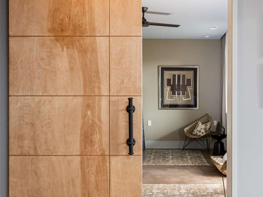 391 High Hickory Trail, Swannanoa, NC 28778.  MLS# CAR4255021, YatesRealty ID 12669. Barn door to Bunk room