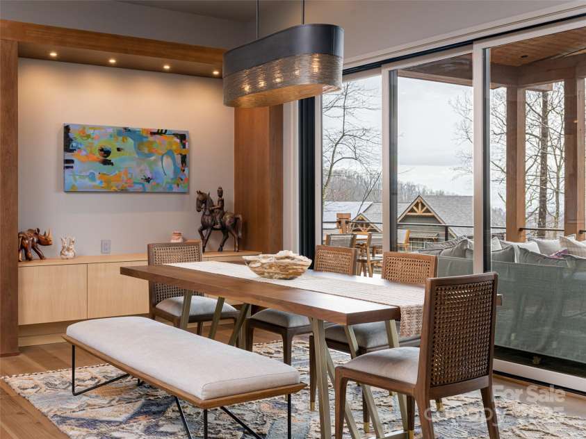 391 High Hickory Trail, Swannanoa, NC 28778.  MLS# CAR4255021, YatesRealty ID 12669. Dining Room opens to covered deck