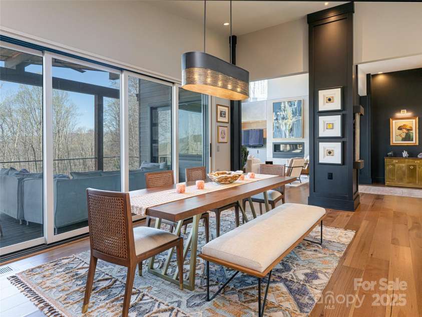 391 High Hickory Trail, Swannanoa, NC 28778.  MLS# CAR4255021, YatesRealty ID 12669. Dining Room to Living Room