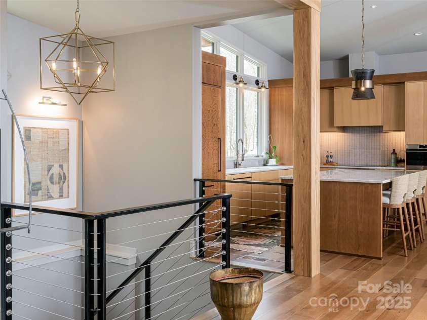 391 High Hickory Trail, Swannanoa, NC 28778.  MLS# CAR4255021, YatesRealty ID 12669. Elegant stairwell to lower level