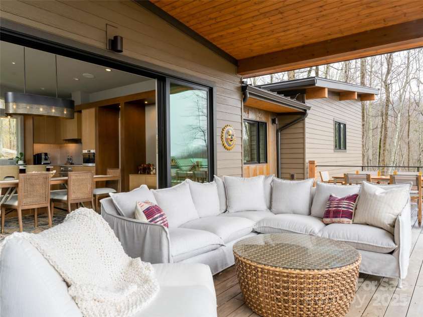 391 High Hickory Trail, Swannanoa, NC 28778.  MLS# CAR4255021, YatesRealty ID 12669. Generous deck for outdoor entertaining