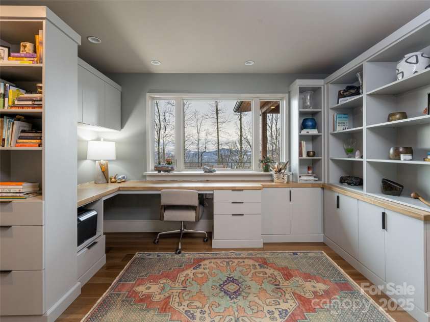 391 High Hickory Trail, Swannanoa, NC 28778.  MLS# CAR4255021, YatesRealty ID 12669. Large Home office on Main Level with Sweeping Views and Custom Built-ins