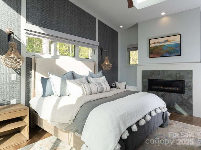 391 High Hickory Trail, Swannanoa, NC 28778.  MLS# CAR4255021, YatesRealty ID 12669. Primary with gas fireplace