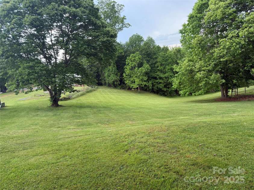 633 Ridge Road, Marion, NC 28752.  MLS# CAR4252646, YatesRealty ID 12672. Back Yard