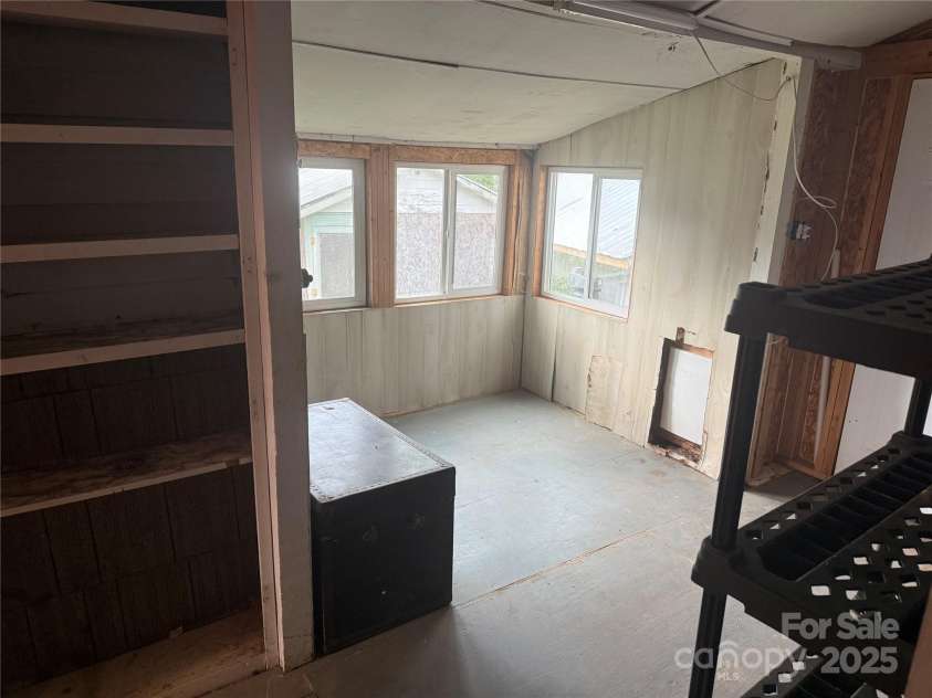 633 Ridge Road, Marion, NC 28752.  MLS# CAR4252646, YatesRealty ID 12672. Closed in Back Porch