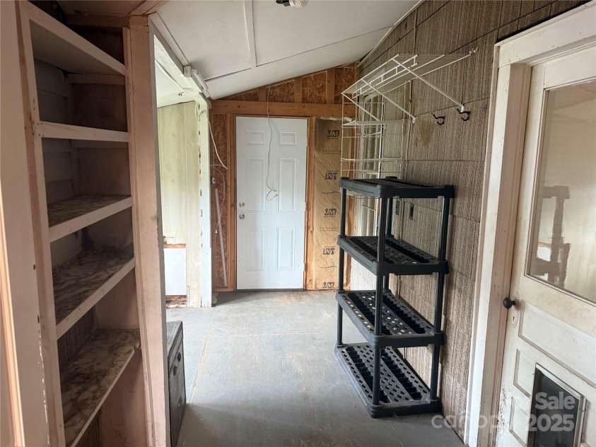 633 Ridge Road, Marion, NC 28752.  MLS# CAR4252646, YatesRealty ID 12672. Closed in Back Porch