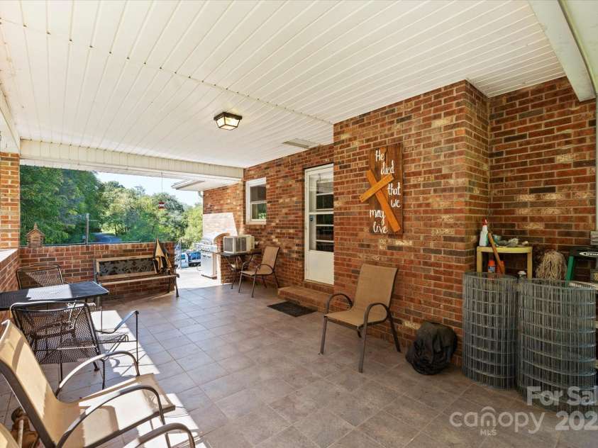 1623 Ammons Branch Road, Marshall, NC 28753.  MLS# CAR4307032, YatesRealty ID 12675. Covered front porch