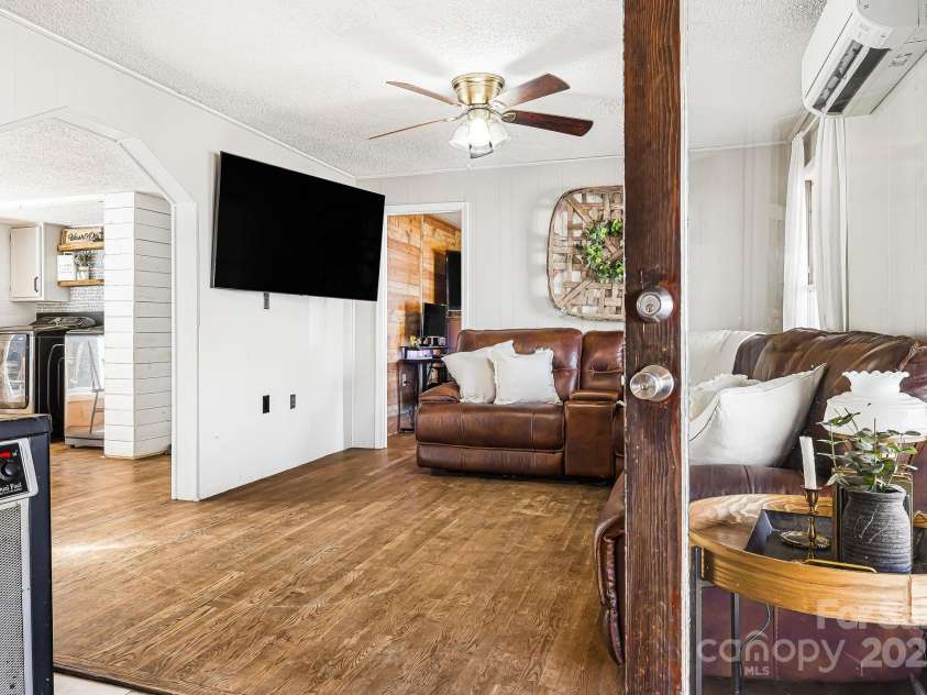 1178 Fork Road, Marshall, NC 28753.  MLS# CAR4219745, YatesRealty ID 12676. Living room as you walk in the front door