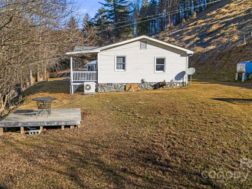 1178 Fork Road, Marshall, NC 28753.  MLS# CAR4219745, YatesRealty ID 12676. Side yard perfect for gardening