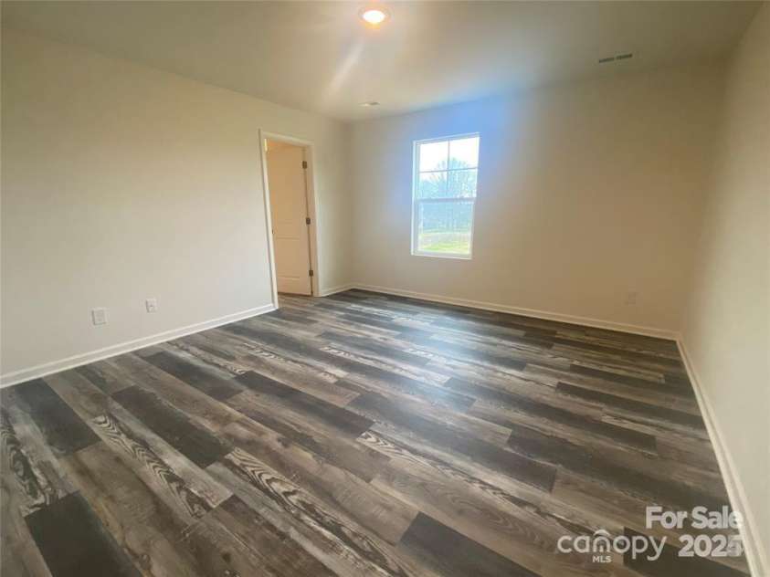 104 Salem Springs Lane, Statesville, NC 28625.  MLS# CAR4203087, YatesRealty ID 12678. PRIMARY BEDROOM