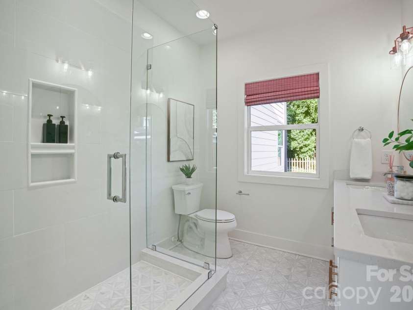 526 Seldon Drive, Charlotte, NC 28216.  MLS# CAR4423284, YatesRealty ID 12680. Primary Bathroom #1 (Main Level - Ideal Guest Suite)