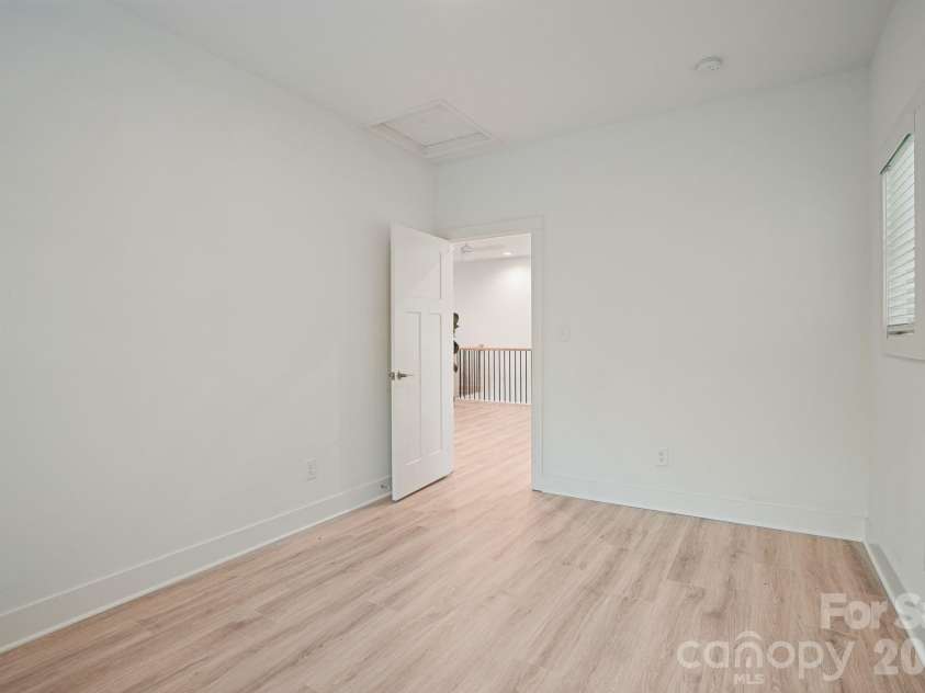 526 Seldon Drive, Charlotte, NC 28216.  MLS# CAR4423284, YatesRealty ID 12680. Secondary Bedroom #3 (Upper Level)