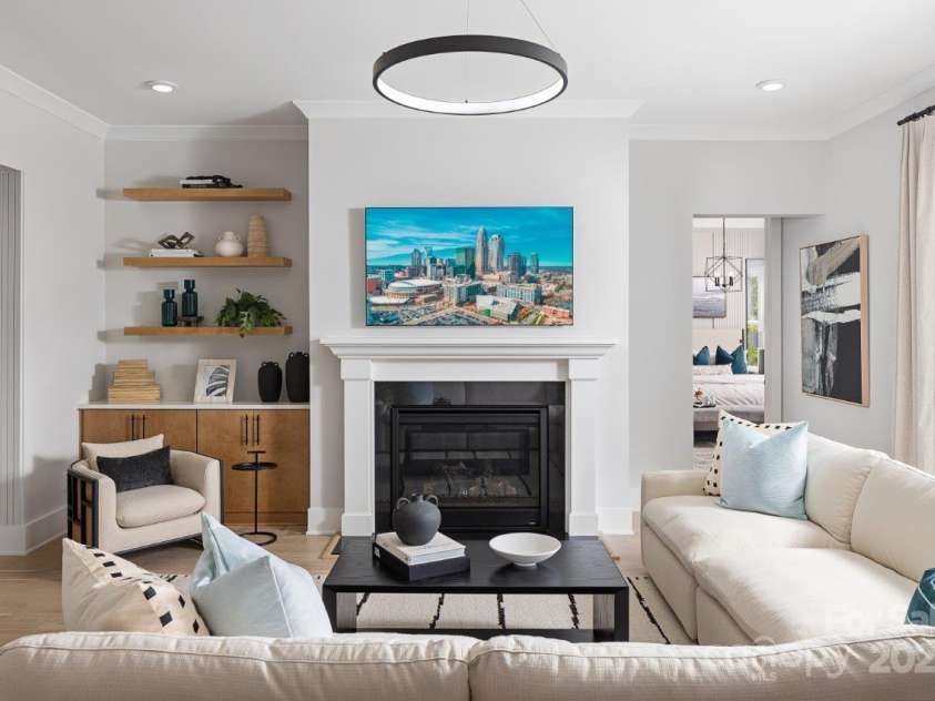 5209 Mint Harbor Way, Charlotte, NC 28269.  MLS# CAR4156538, YatesRealty ID 12683. Please note that the image shown is of a model home and is intended for illustrative purposes only. Features and finishes may vary in the actual units.