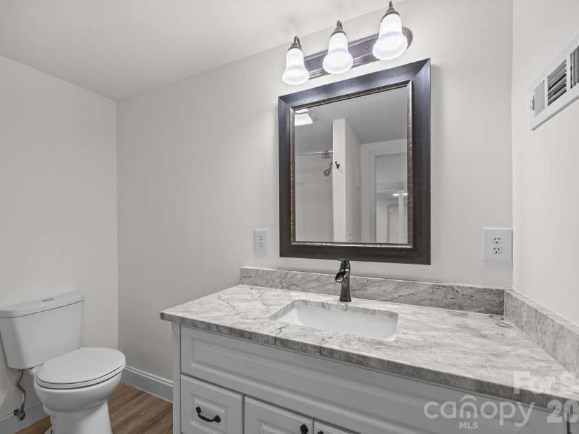 164 Lakeside Drive, Asheville, NC 28806.  MLS# CAR4343337, YatesRealty ID 12684. Ensuite basement bathroom